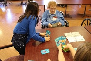 Twice a month, the 4th graders are paired with a resident, and they spend time together reading books, doing arts and crafts, and sharing stories. The program has made a tremendous impact on the residents and the students.