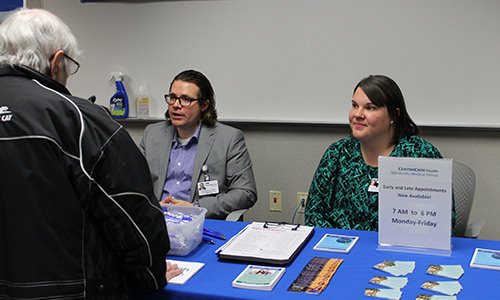 Evan Dyce, APRN, CNP, DNP, and Kristy Peterfeso, APRN, CNP, enjoy taking part in a local health fair.