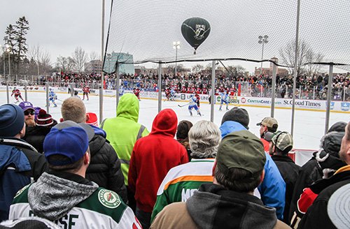 A large crowd takes in the action at Hockey Day Minnesota 2018 at St. Cloud’s Lake George.