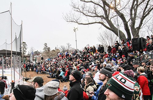 A large crowd takes in the action at Hockey Day Minnesota 2018 at St. Cloud’s Lake George.